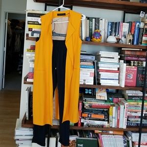 ZARA mustard vest paired with jogger navy pan